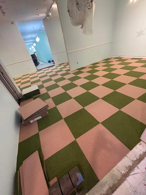 Pink-and-green checkerboard floor in the store
