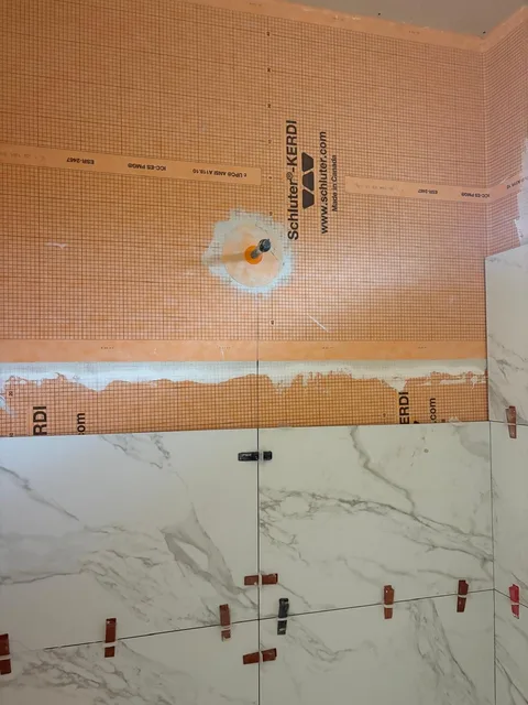 First rows of marble-look wall tile
