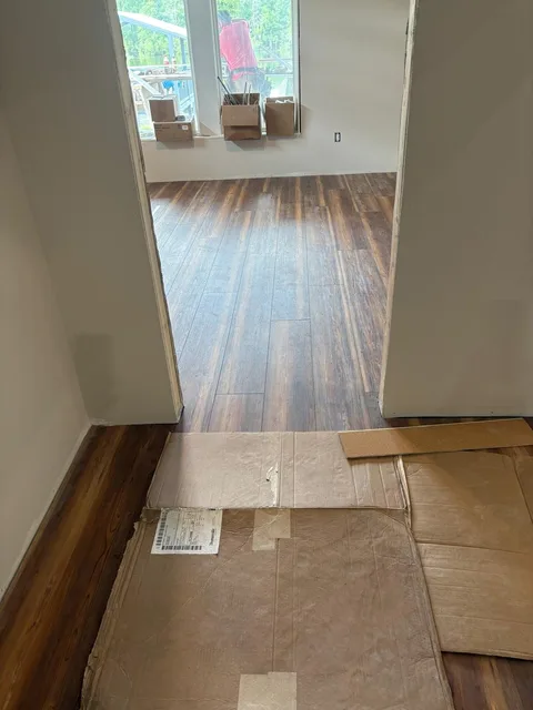 Plank running through doorways without transitions